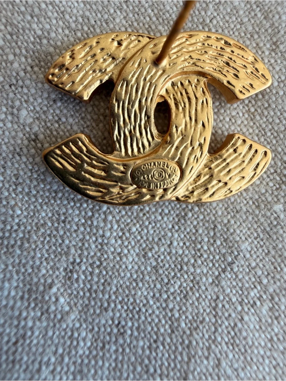 CHANEL gold tone